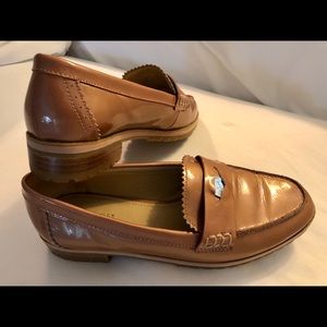 Coach “Peyton” patent leather loafers
